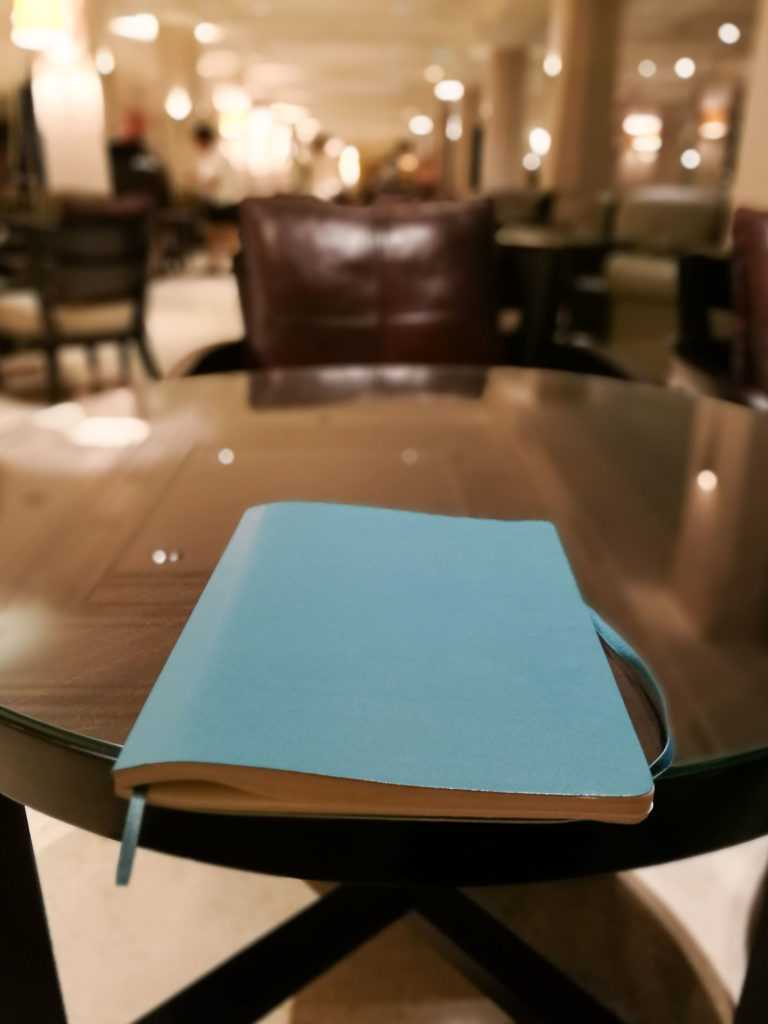 moleskine notebook on a table