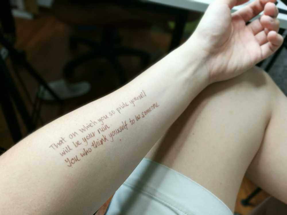fake tattoo of quote