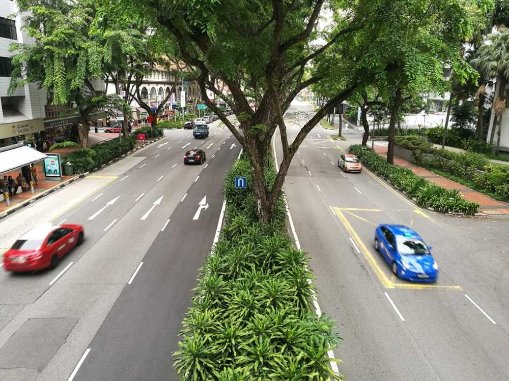 singapore roads viewed from overhead bridge