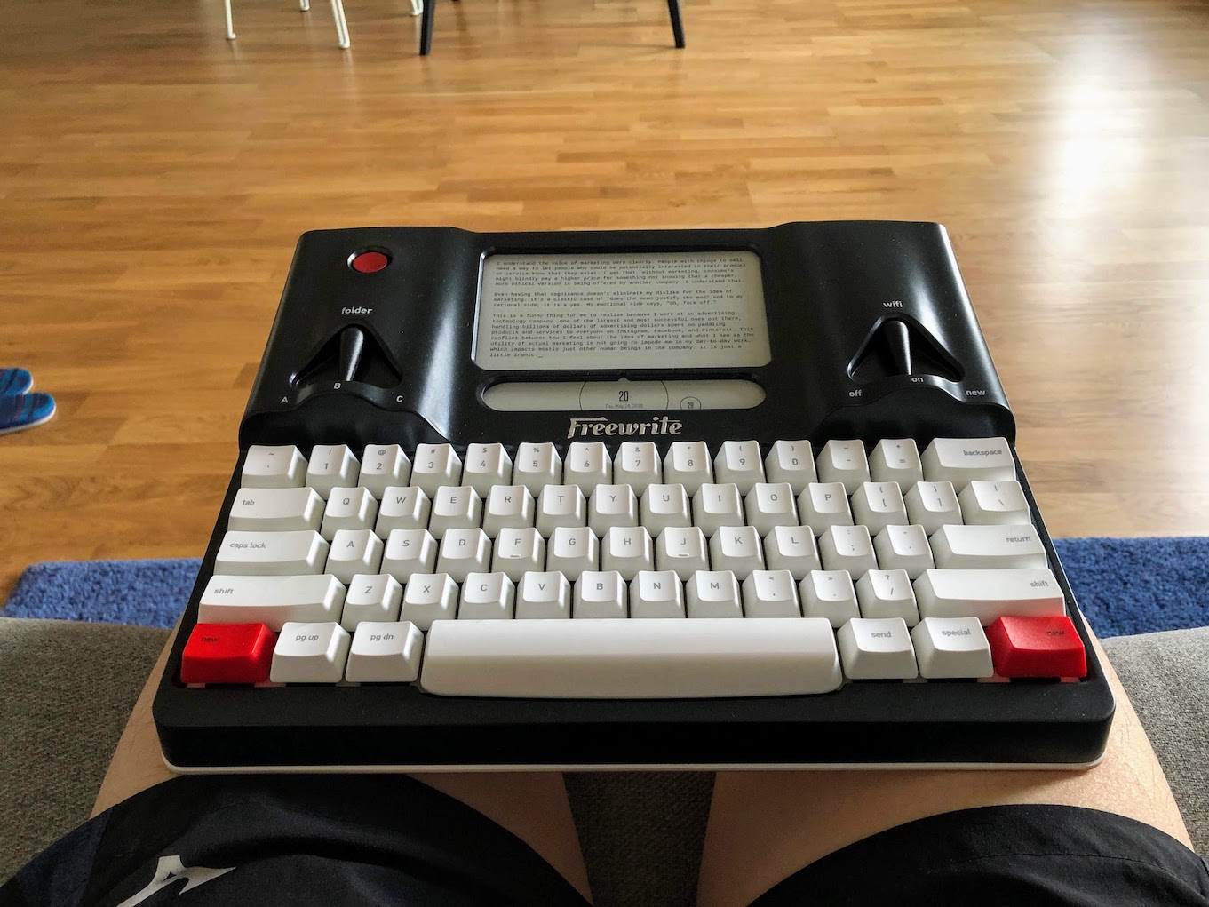 me writing with the Freewrite modern typewriter on my lap