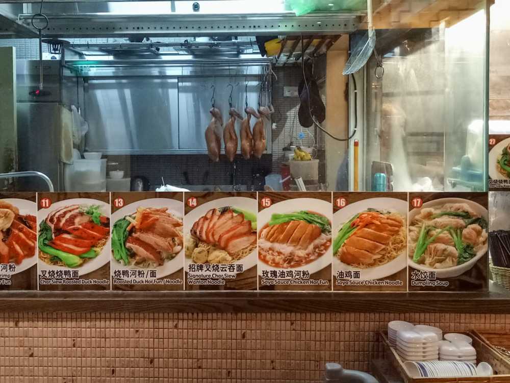 roasted duck hung up at a food stall